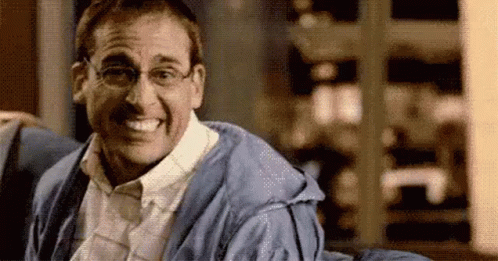Man In Glasses And Blue Robe Smiling GIF