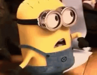 Man in Glasses and Blue Shirt Making Funny Face