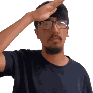 Man in Glasses and Blue Shirt Salutes