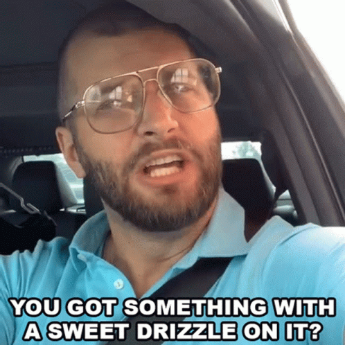 Man In Glasses And Blue Shirt Saying You Got Something With A Sweet Drizzle GIF