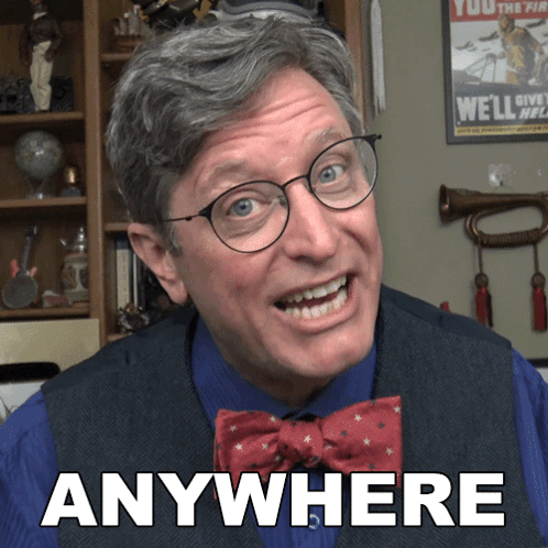 Man In Glasses And Bow Tie Saying Anywhere GIF