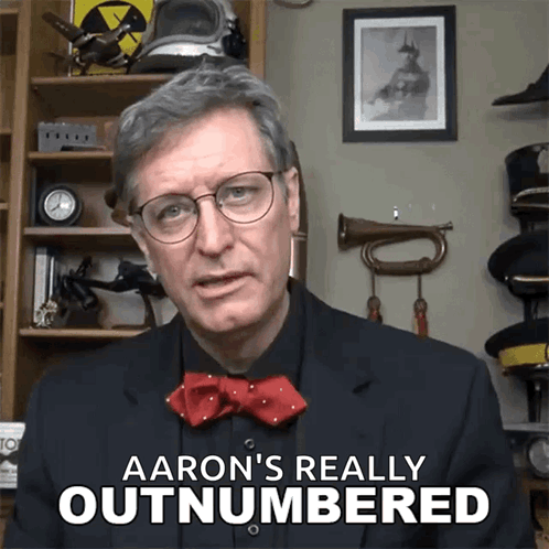 Man In Glasses And Bow Tie Says Aaron's Really Outnumbered GIF