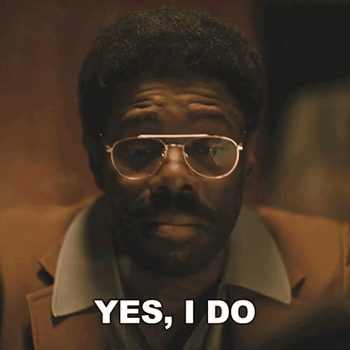 Man in Glasses and Brown Jacket Says Yes I Do