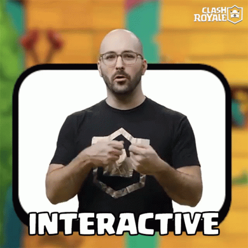 Man in Glasses and Clash Royale Shirt Talking