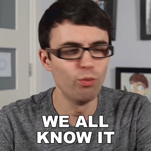Man in Glasses and Grey Shirt Says We All Know It