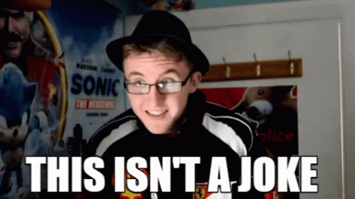 Man in Glasses and Hat Saying This Isn't a Joke