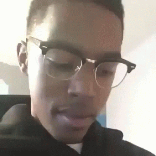 Man in Glasses and Hoodie