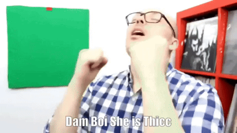 Man in Glasses and Plaid Shirt Making a Fist