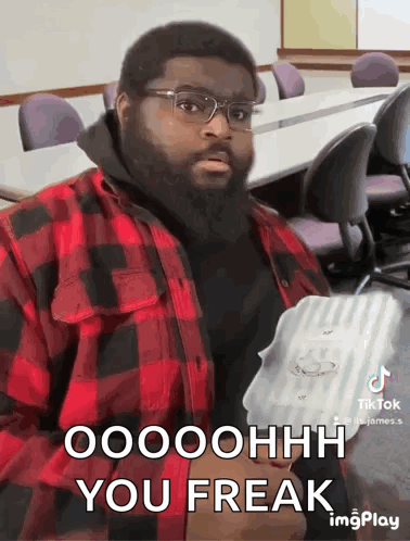 Man In Glasses And Plaid Shirt Saying Oooohhh You Freak GIF