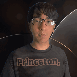 Man in Glasses and Princeton Shirt Looking at Camera
