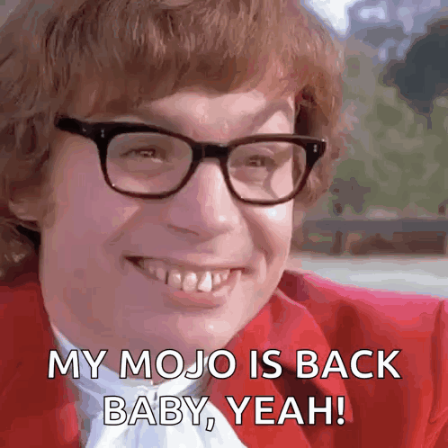 Man in Glasses and Red Jacket Saying Mojo Is Back