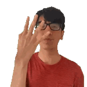 Man in Glasses and Red Shirt Making Peace Sign