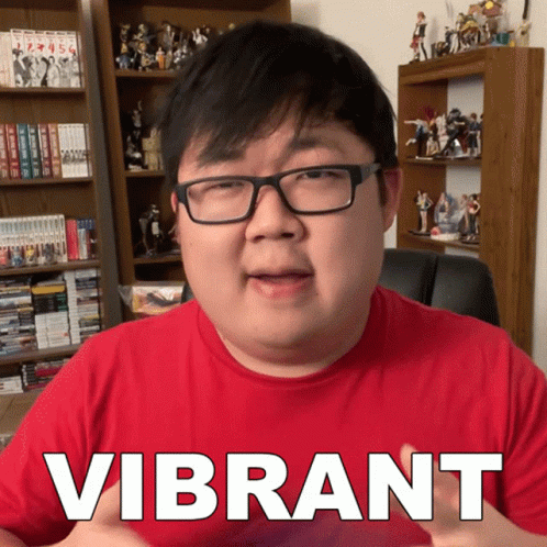 Man In Glasses And Red Shirt Saying Vibrant GIF
