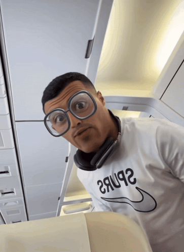 Man in Glasses and Shirt Saying 28u92