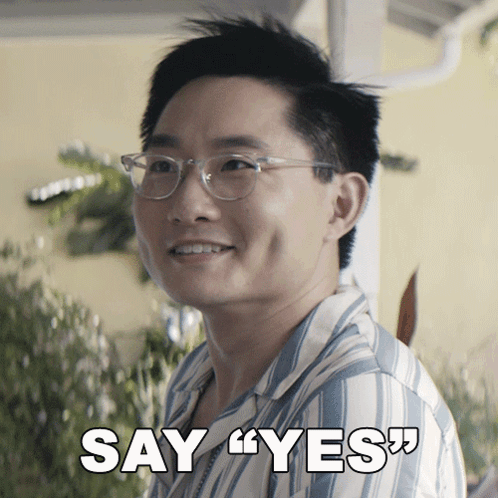 Man In Glasses And Striped Shirt Say Yes GIF
