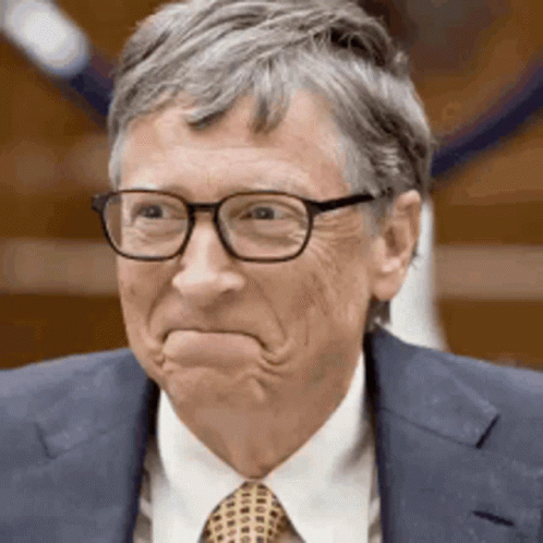Man In Glasses And Suit Making Face GIF