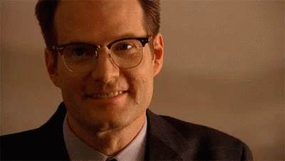 Man In Glasses And Suit Smiling GIF