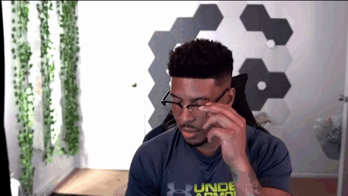 Man in Glasses and Under Armor Shirt