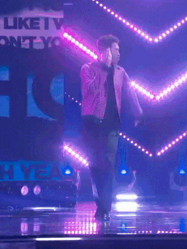 Man in Glasses and Vest Dancing on ABC