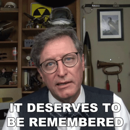 Man In Glasses And Vest Says It Deserves To Be Remembered GIF