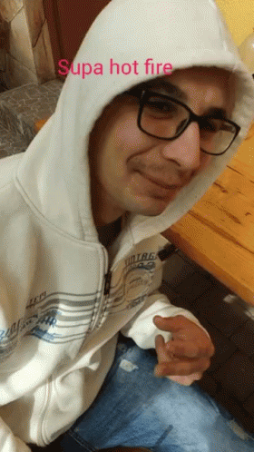 Man in Glasses and White Hoodie Supa Hot Fire