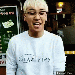 Man in Glasses and White Shirt Saying Everything