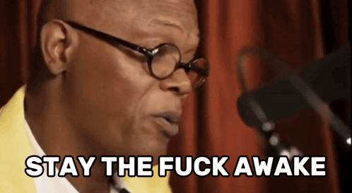 Man in Glasses and Yellow Jacket Saying Stay the Fuck Awake