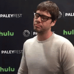 Man in Glasses at Paleyfest Wall