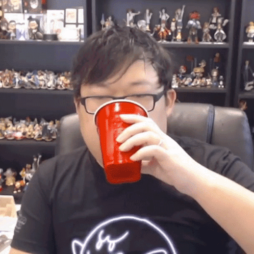 Man In Glasses Black Shirt Drinking Red Cup GIF