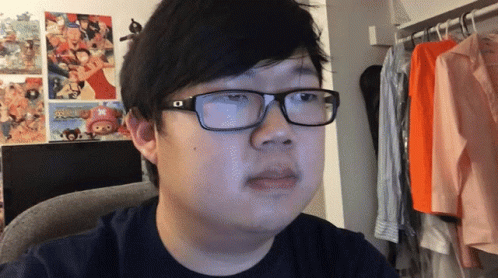 Man In Glasses Looking At Camera GIF