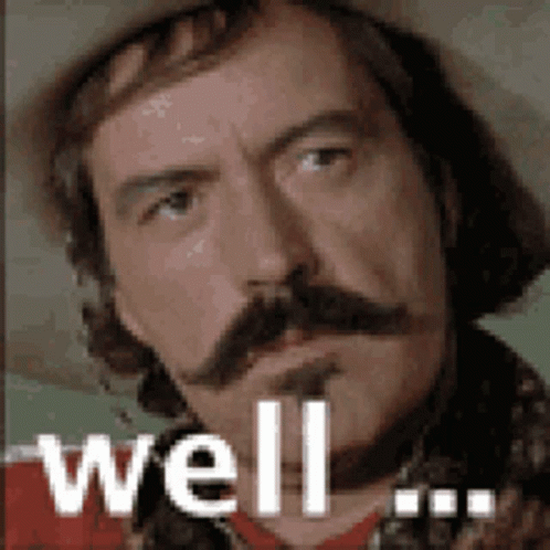 Man In Glasses Making Funny Face And Smiling GIF