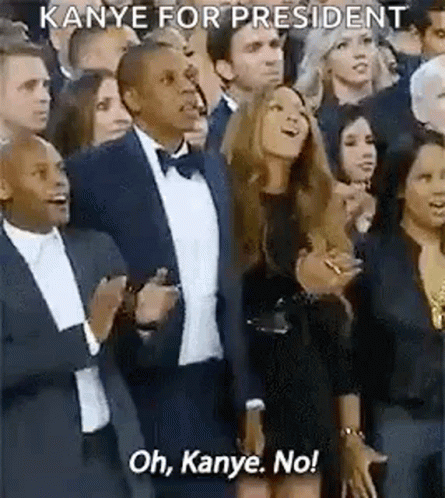 Man In Glasses Pointing At Cat And Man GIF