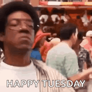 Man in Glasses Saying Happy Tuesday
