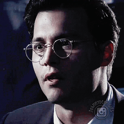 Man in Glasses Saying Johnny