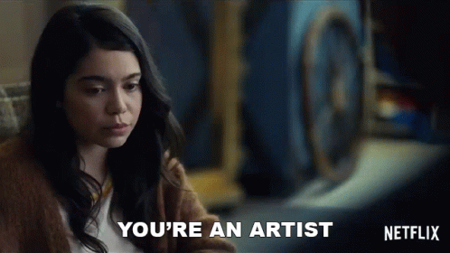Man in Glasses Saying You're an Artist