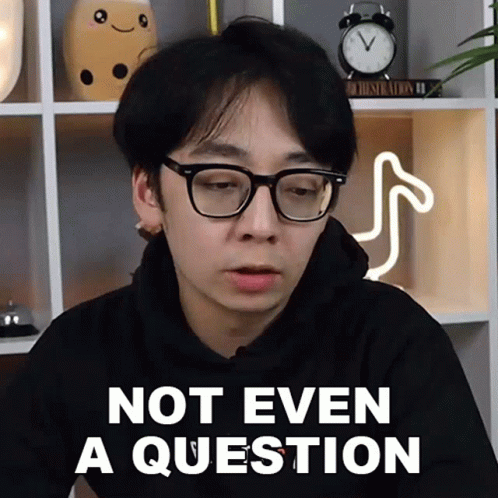 Man in Glasses Says Not Even a Question in Front of Clock