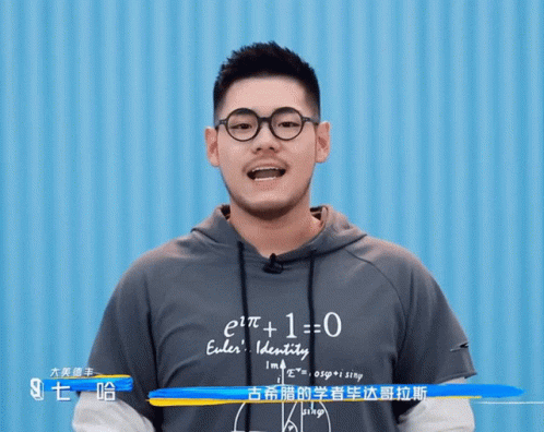 Man in Glasses Shirt Saying e2t1 + 1 = 0