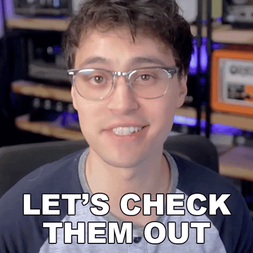 Man in Glasses Smiling Saying Lets Check Them Out