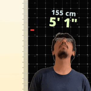 Man in Glasses Standing by Ruler Saying 155 cm 5'1