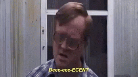 Man in Glasses Standing in Front of Screen Door
