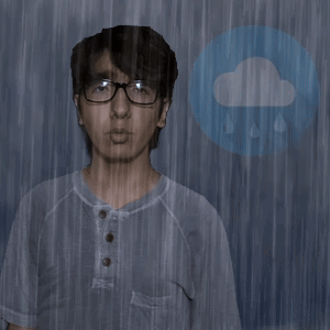Man in Glasses Standing in Rain