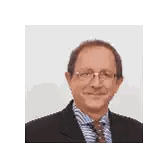Man in Glasses Suit and Tie