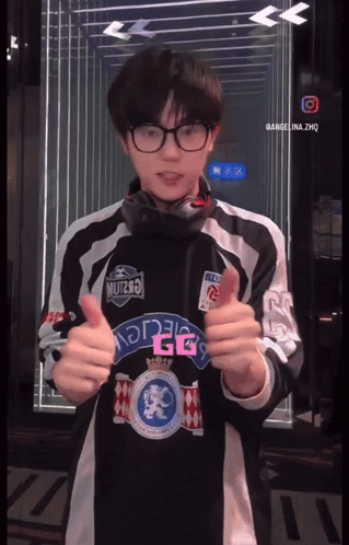 Man in Glasses Wearing GG Shirt