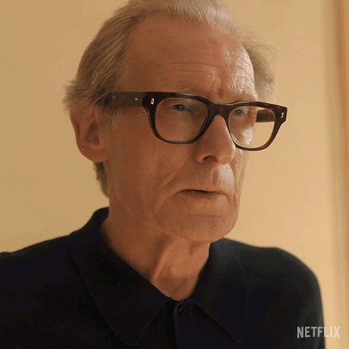 Man in Glasses With Netflix Logo