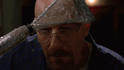 Man in Glasses With Plastic Bag on Head