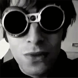 Man in Goggles Making Face Black and White
