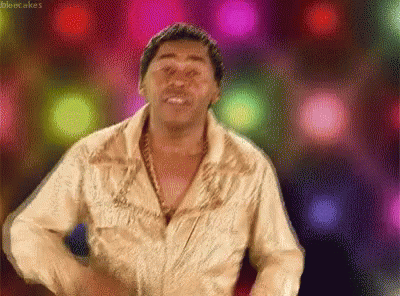 Man in Gold Shirt Dancing Silent Cakes