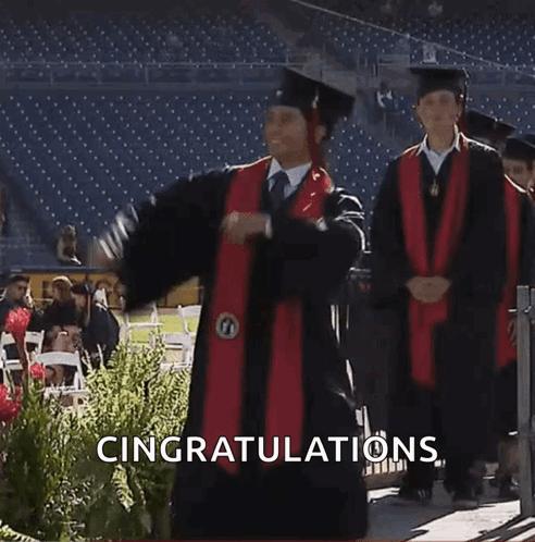 Man In Graduation Cap And Gown Celebrating GIF