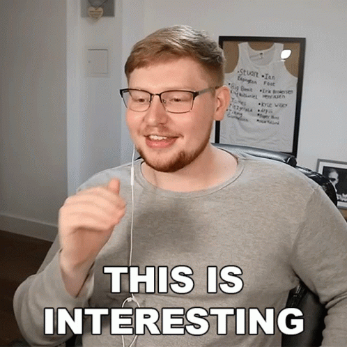 Man in Gray Shirt and Glasses Says This Is Interesting