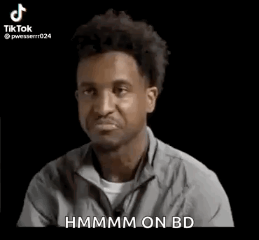 Man in Gray Shirt Making Funny Face Saying Hmm on BD